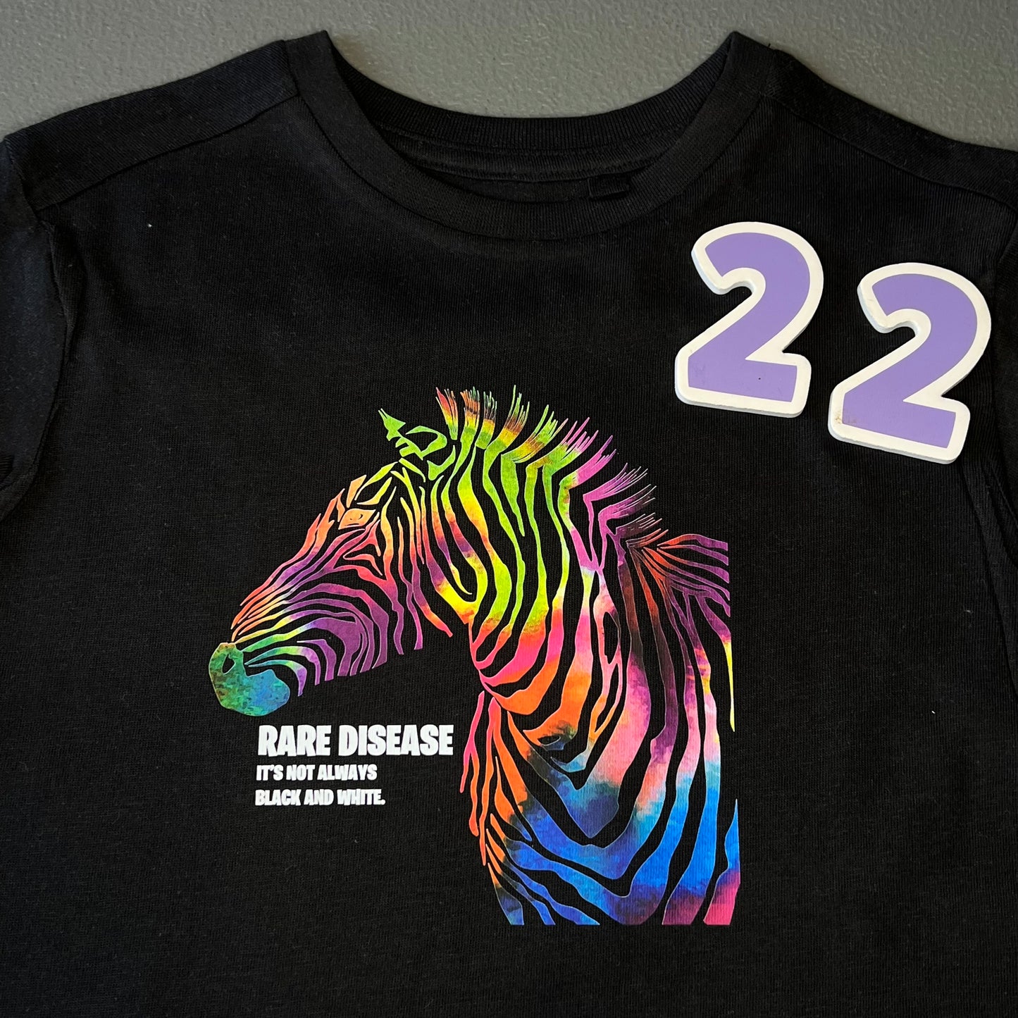 Bargain Bin #22 Rare Disease Tee Size 1